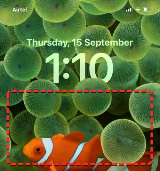 如何在 iOS 16 中將時間置於壁紙後面